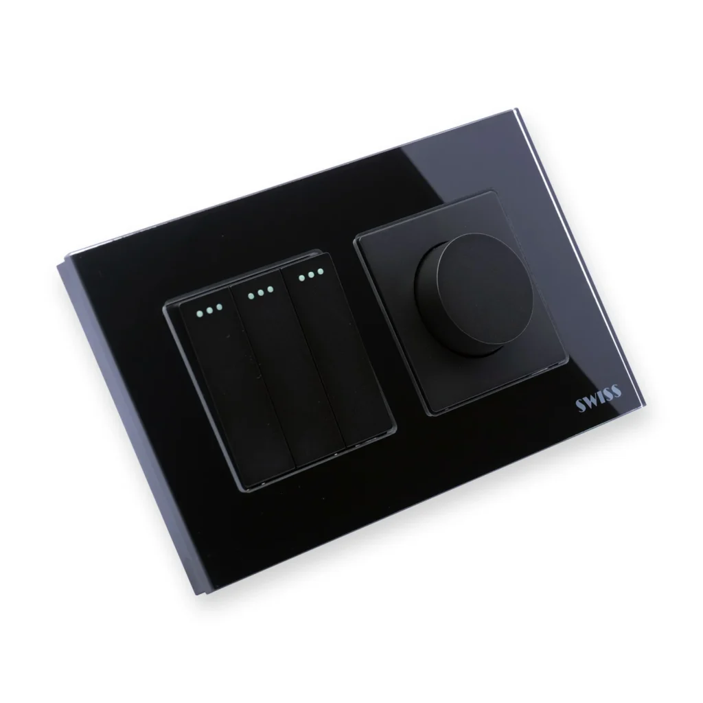 Swiss Luxury 3 Gang Switch and Dimmer in black glass, three rocker switches beside a round dimmer knob