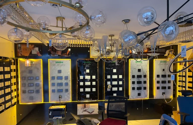 Lit display boards of Swiss switch ranges inside our Lahore showroom