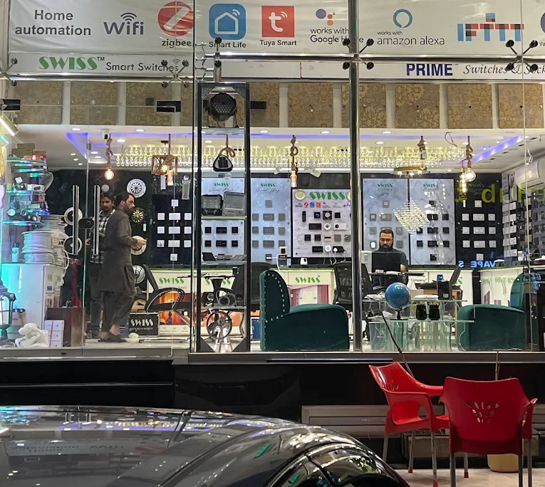 Our Lahore showroom seen through its glass front, with home automation banners above