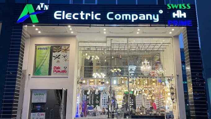The Swiss Home Automation Lahore showroom storefront at night